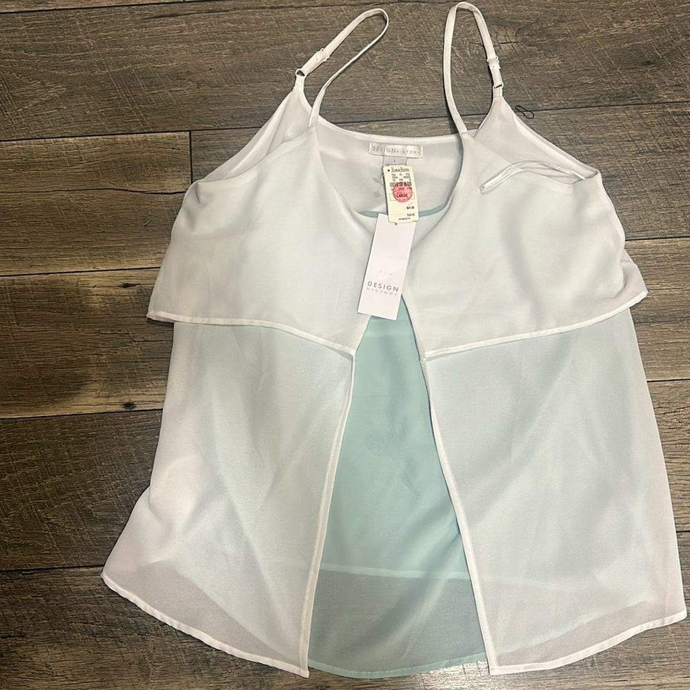 Design History top size L. Brand new